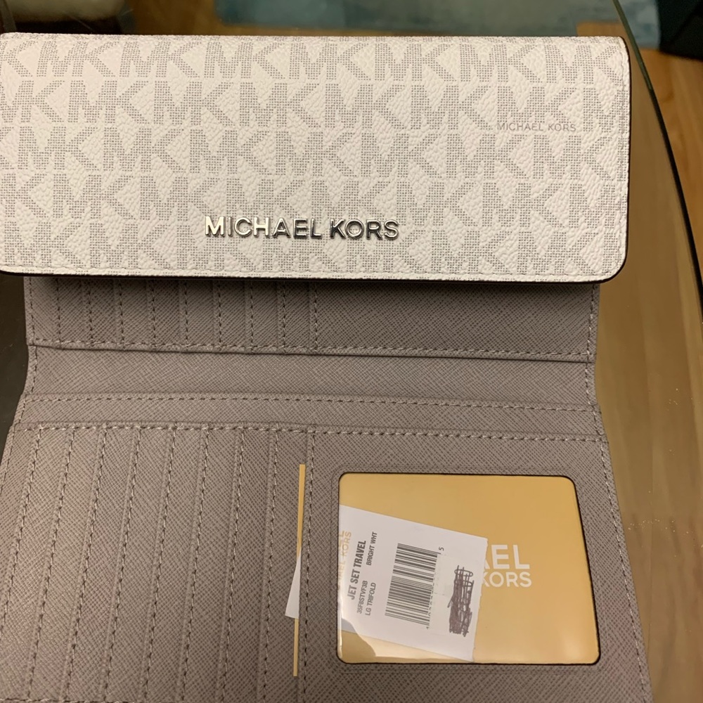 Michael Kors clutch with Tag never used